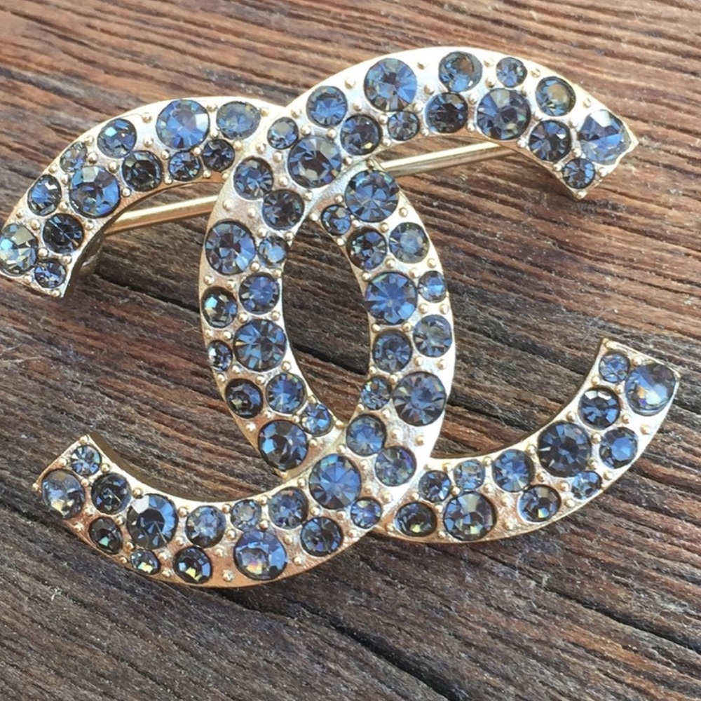 Gold with black crystals Chanel CC brooch